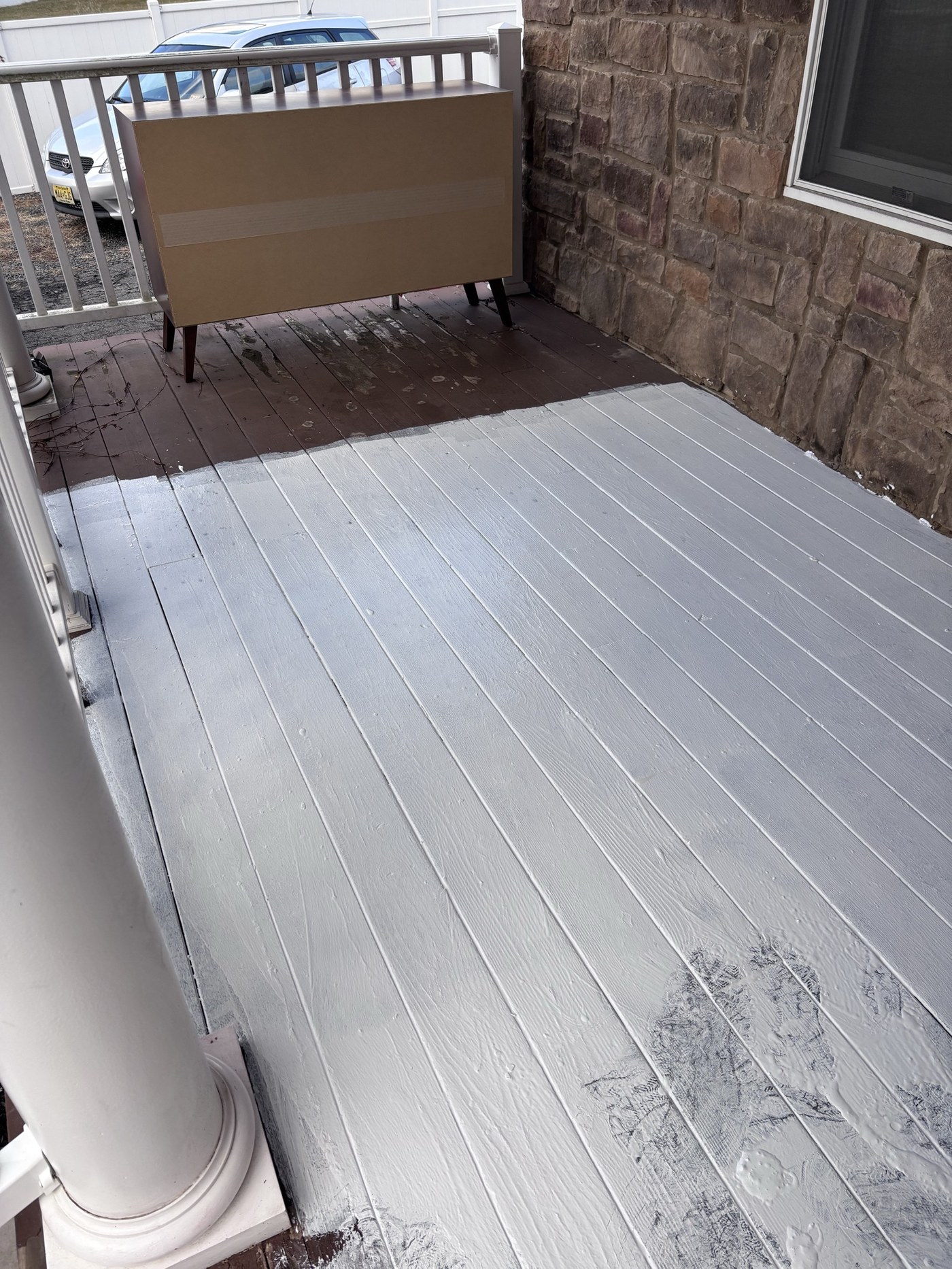 Restored exterior porch after remediation and finish work by Vice Capital Corporation.